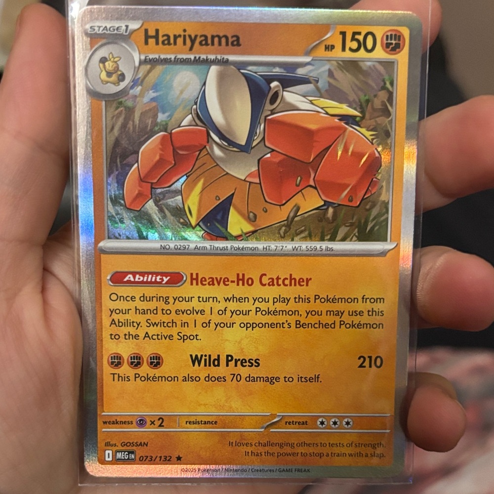 Pokemon Hariyama Card with Orange and Blue Accents